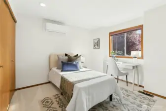 Bedroom with mini split, great for a perfectly cooled office space.