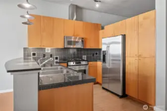 Guests can chat with the chef from the breakfast bar in this social layout.