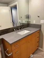 Undermount sink & tile accents.