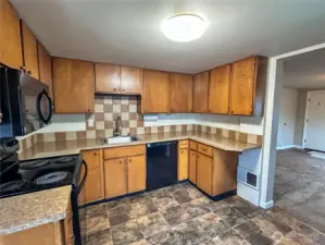 Wood cabinets, in a great kitchen space