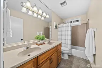 Full guest bathroom with dual sinks!