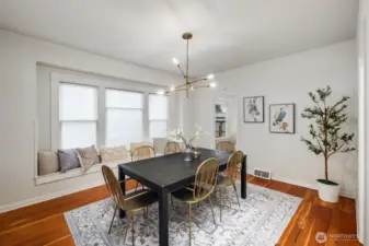 Want more privacy? Lovely shades let light in to the dining room