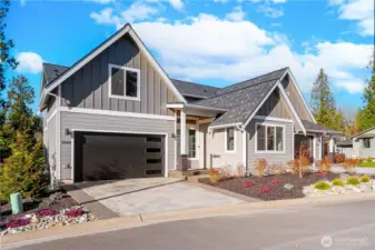 9069 Sea Smoke Lane is on a new construction single-family with nice landscaping already done - fully maintained by the HOA so you don't have to do any yard work!