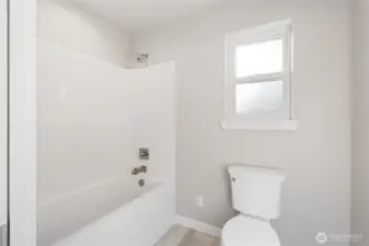 This is the separate toilet and shower/bath off the Jack & Jill bathroom.