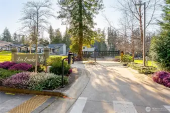 Gated entrance into the private and secure Sea Smoke new construction development.