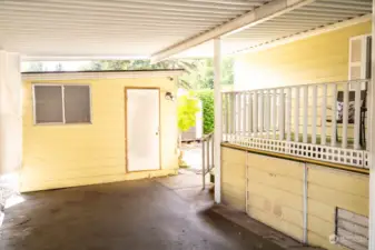 Nice covered carport -space for 2 cars plus keep dry with the rain / privacy barrier