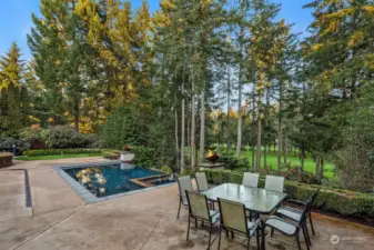 kitchen side of the patio with views of the award winning golf course & infinity pool