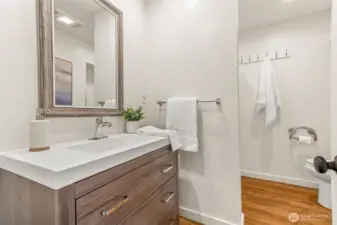 the main bathroom has been updated, and doubles as a great powder room, too!