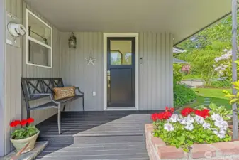 A covered porch in the Pacific Northwest is a must! Welcome home to your new serene retreat on the bay!