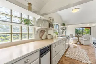 The vaulted ceilings begin here - and extend into the cozy eating nook!
