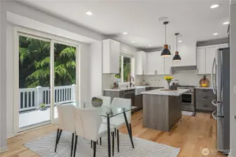 A charming breakfast nook sits just off the kitchen