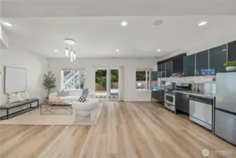 A spacious family room offers a comfortable gathering space for everyday living and entertaining.