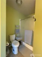 5-piece bathroom off of main bedroom with separate shower.