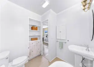 Primary bathroom looking into primary bedroom