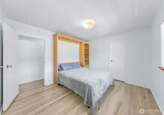 2nd bedroom with opened queen sized murphy bed