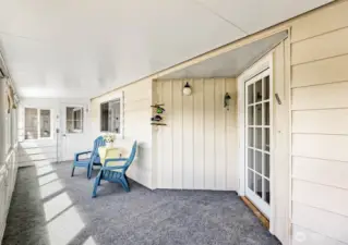 Sunroom with sunroom door on the right to the living room area
