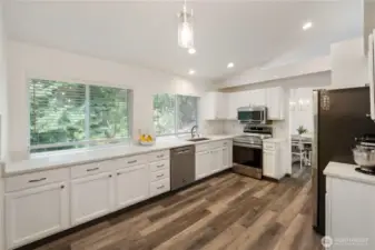 Kitchen  Updated kitchen featuring ample counter space, modern appliances, and a convenient layout for home chefs.