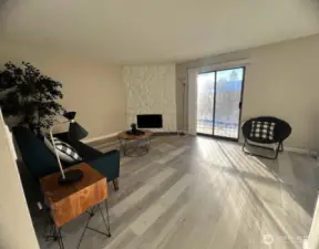 Cozy Living Room with Wood burning FP; Slider to Patio