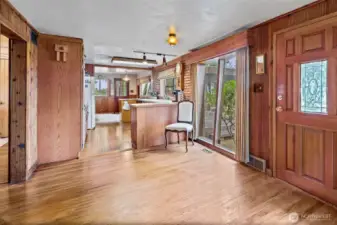 Open entry with unique mid-century style sloped windows