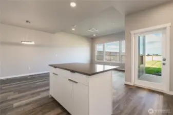 Door to right leads to covered patio and backyard