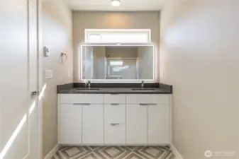 Ensuite with double sinks and back lit mirror