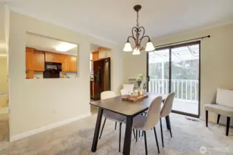Dining room with sliding doors to upper deck