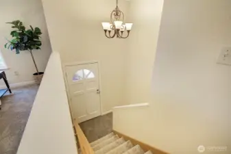 Entry with stairs to lower level.