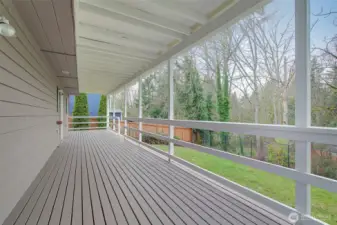 Lower covered deck runs the length of the house.