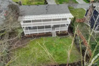 Aerial view of back yard and back of house.