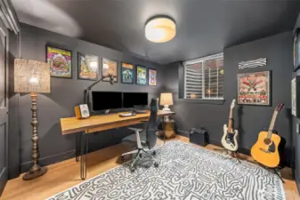 Lower-level Bedroom Four offers privacy and flexibility, ideal for a guest suite, media room, or dedicated home office within the permitted ADU.