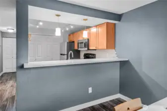 Looking back to the kitchen from the dining area. You can easily place bar stools here.
