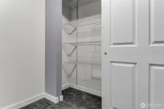 Closet system in second bedroom maximizes storage.