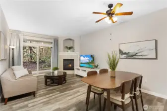 The bright and airy living room is perfectly positioned to capture calming greenbelt views. Large windows invite in natural light while showcasing the peaceful natural surroundings beyond.