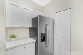 Whether preparing weeknight meals or hosting friends, this space feels open, practical, and welcoming.