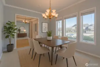 Virtually staged. Formal dining room is perfect for gatherings.