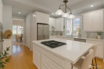Virtually staged. Bright kitchen features a center island with a gas cooktop for easy prep and stainless appliances for modern convenience.