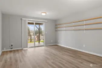Large family room with sliding glass door leading to the backyard. This has a closet and can be used as the 5th bedroom.