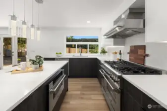 New custom cabinets, 3CM quartz countertops, ZLine and Samsung appliances, and a custom backsplash.