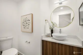 Main floor powder room, a new addition in this fully reconfigured home