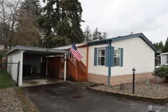 Welcome home! Carport, driveway parking and side parking!