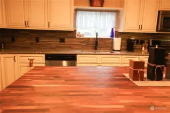 Food grade walnut countertop on the island.