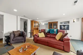 The family room from one of the lounge chairs. Relaxation at the end of the day. For media entertainment, five speakers for that surround sound experience.
