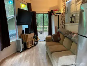 Plenty of room to watch some TV in covered deck area