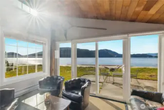 Walls of windows and doors frame the view.