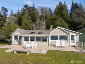 House at 4942 West Shore facing the water.