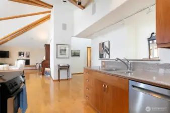 View from Kitchen to Living Area - Hall to Bedrooms Center Right