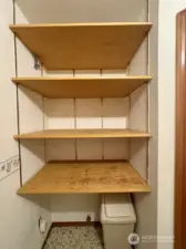 Shelves in the utility room are great for storage!