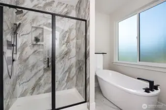 Primary shower with full tile surround