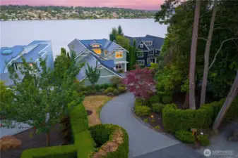Dramatic, street to water property with a quiet, private driveway.