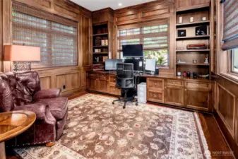 On the south west side of the home, the perfect home office awaits with dramatic woodwork.